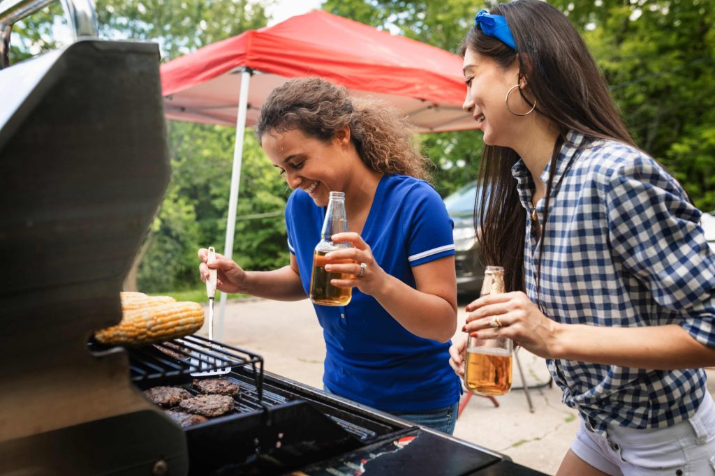 Tailgating Party Bus Service Austin people grilling